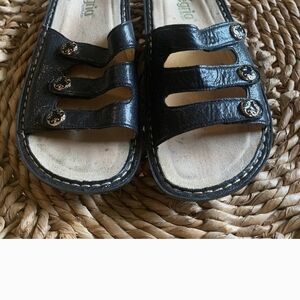 Alegria Black Leather Sandals with Decorative Buttons